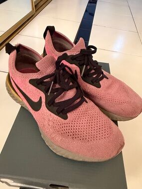 Nike Women's Pink Knit Running Shoes with Black Swoosh